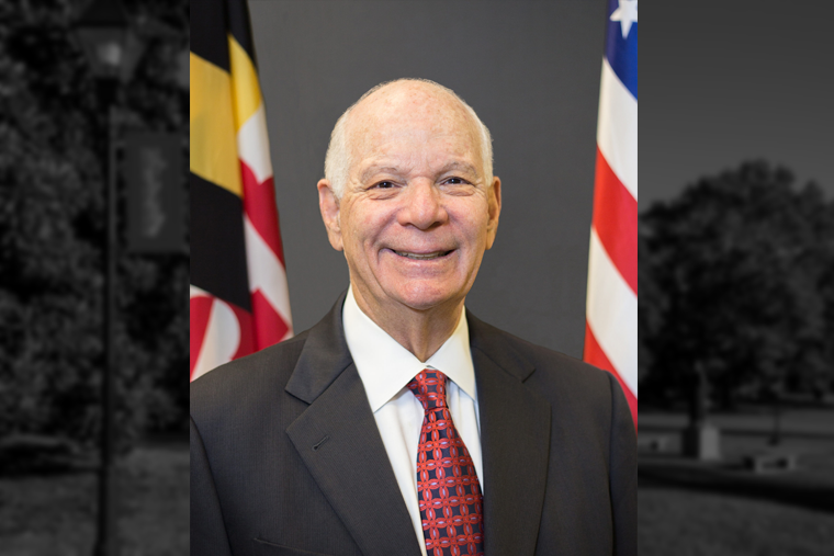 portrait of Sen. Ben Cardin with the American and Maryland flags behind him